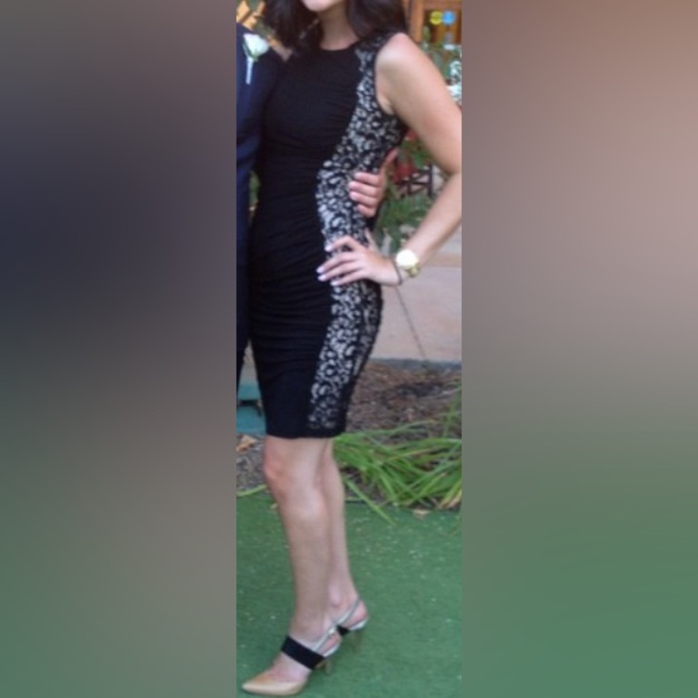 Black dress with nude lace side detail and rouging
